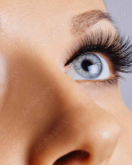 Woman eyes with long eyelashes and smokey eyes make-up. Eyelash extensions, makeup, cosmetics, beauty